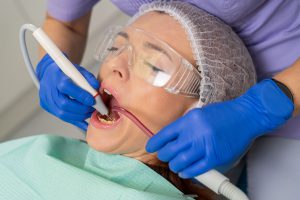 tratamientos de periodoncia en Carabanchel - mujer